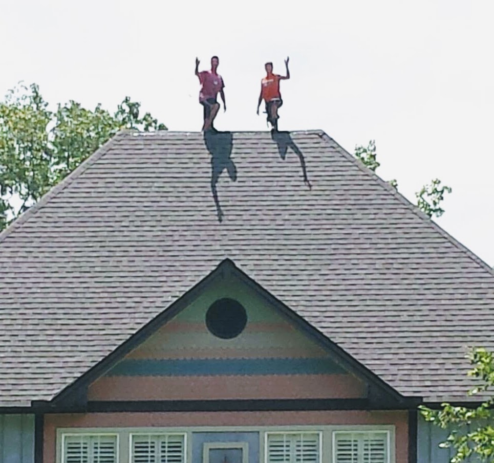 Phillips Roofing crew on top of a finished Alabama roof
